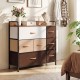 7-drawer tower dresser with a steel frame and wooden top, featuring fabric drawers, ideal for bedroom storage.
