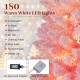 Snow-flocked pink Christmas tree with 180 warm white LED lights and 8 lighting modes for festive holiday decoration.