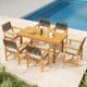 7-piece patio dining set featuring a rectangular acacia wood table and 6 armchairs with woven rope seats, perfect for.
