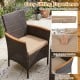 Single chair from the 7-piece patio dining set featuring a soft padded cushion and ergonomic curved armrests for.