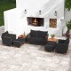 7-piece black PE rattan sectional sofa set with acacia wood table, ideal for outdoor patio relaxation and gatherings.