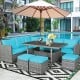 7-piece patio rattan dining set with turquoise cushions, including corner chairs, table, and ottomans for outdoor.