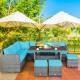7-piece patio rattan dining furniture set with turquoise cushions, including sectional sofa, table, and ottomans for.