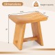 Curved teak shower bench with dimensions 19.5" x 12" x 18", offering durability and comfort for shaving legs.