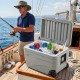 Portable 84 Quart wheeled ice cooler in gray with foldable pull handle, ideal for keeping drinks cold on fishing trips.