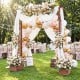 Wooden garden arbor with planter boxes and hanging roof, perfect for elegant wedding setups and climbing plants.