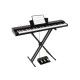 88-key keyboard piano set in black with adjustable stand, removable music stand, and dual speakers for versatile music.