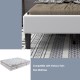 Platform bed with beige button tufted headboard, sturdy construction, and 7-inch under-bed storage space for twin.