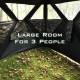 Spacious interior of a 3-person portable pop-up hunting blind with camouflage design, ideal for outdoor use.