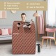 Portable personal steam sauna tent with waterproof fabric, remote control, and detachable folding chair for easy use.