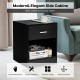 Black nightstand with storage drawer and open compartment, perfect for bedside or living room use, featuring sturdy.
