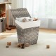 Handwoven gray laundry hamper with flip lid and removable liner, perfect for bathroom or laundry room storage.