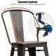 Ergonomic backrest of a metal counter stool, designed for comfort and support, ideal for dining or bistro settings.