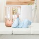 Foldable memory foam baby mattress in use, featuring a tri-fold design for easy storage and travel, ideal for playpens.