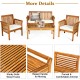 4-piece outdoor acacia wood sofa set with thick cushions, curved armrests, perfect for patio or garden relaxation.