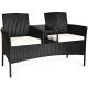 Wicker patio conversation set with removable cushions and tempered glass table, ideal for garden or balcony use.
