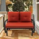 Brick red cushioned 2-person glider bench with ergonomic armrests, perfect for patio and backyard relaxation.