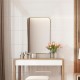 Rectangular 32x20 inch wall-mounted mirror with a golden metal frame, ideal for bathrooms and living rooms.