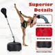 Freestanding punching bag with adjustable height, durable base, and breathable gloves for fitness training at home.