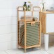Tilt-out bamboo laundry hamper with removable liner and 2-tier shelf, ideal for bathroom or bedroom storage.
