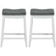 Set of 2 nailhead saddle bar stools with soft upholstery and rubber wood legs, ideal for kitchen or bar use.