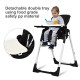 Foldable high chair in black with adjustable backrest, detachable tray, and 5-point safety restraint for baby comfort.