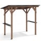 Cedar wood BBQ gazebo with a sloped metal roof and two side serving shelves for outdoor cooking and gatherings.