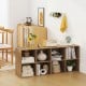 8-cube bookshelf in natural finish with storage bins and decor, ideal for organizing and displaying items in any room.