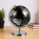 Modern 8" black and silver decorative tabletop globe with 360° rotation, perfect for home or office decor.