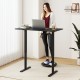 Ergonomic electric standing desk in black, 48"x24", with adjustable height and digital control panel for home office.