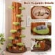 Tall brown cat tree with private condos, sisal scratching panel, and plant-shaped toys for indoor feline fun.
