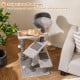 Cat tree with three spacious platforms, soft plush fabric, and sisal scratching posts for climbing and lounging.