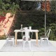 Set of 4 Tolix style metal dining chairs with wood seats, perfect for kitchen or dining room use.