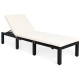 Side view of a height adjustable rattan lounge chair with a soft white cushion, ideal for outdoor relaxation on the.