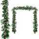 9-foot pre-lit Christmas garland with snow-flocked tips and red berries, featuring 50 LED lights for festive indoor or.