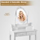 Rounded and rotatable mirror of a white makeup vanity set with dimmable bulbs for versatile lighting needs.