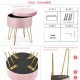 Round pink velvet storage ottoman with golden hairpin legs, ideal for dressing tables and organizing essentials.