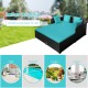Spacious outdoor rattan daybed in turquoise with upholstered cushions and pillows, perfect for patio or poolside.