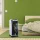 Portable evaporative air cooler with 3 wind modes, ideal for home or office use, shown in a bedroom setting.