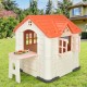 Kid’s playhouse with pink roof, windows, and table, made from durable HDPE for indoor and outdoor fun.