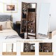 Standing jewelry cabinet with full-length mirror in brown, featuring organized storage for jewelry and cosmetics.