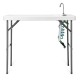 Folding cleaning sink table with quick-connect faucet and sprayer, ideal for outdoor cleaning and potting tasks.
