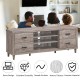 Retro wooden TV stand with 3 open shelves and 4 drawers, designed for flat screen TVs up to 65", perfect for living.