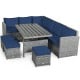 Sectional sofa with navy cushions from the 7-piece patio rattan dining set, ideal for creating a cozy outdoor space.