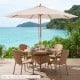 Beige 9 FT patio umbrella with 8 bamboo ribs, providing sun protection for outdoor dining by the pool.