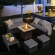 9-piece outdoor PE rattan wicker sectional sofa set with gray cushions and a 42-inch gas fire pit table for cozy.