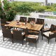 9-piece patio dining set featuring PE wicker chairs with cushions and an acacia wood table, perfect for outdoor.