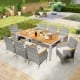 9-piece patio dining set featuring PE wicker chairs and acacia wood table, perfect for outdoor dining in gardens or.