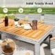 Solid acacia wood tabletop of a 9-piece patio dining set, featuring a splinter-free surface for outdoor dining.