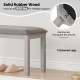 Upholstered bedroom bench with gray padded seat and solid rubber wood legs, supporting up to 800 lbs for versatile use.